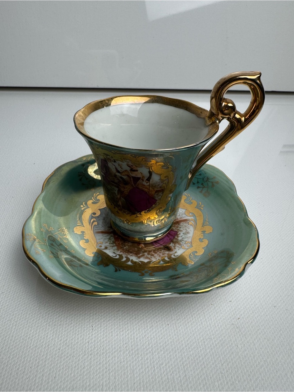KPM Porcelain Cup & Saucer Set Green w/ Gold Trim Romantic Theme Decorated